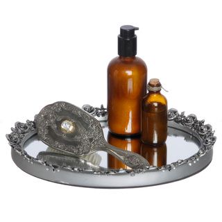 Antique Silver Oval Resin Mirror Tray (Antique silverMaterials Glass/resin Dimensions 1.5 inches high x 12 inches wide x 9 inches deepThe digital images we display have the most accurate color possible. However, due to differences in computer monitors, 