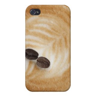 Close up of two coffee beans on a cup of case for iPhone 4