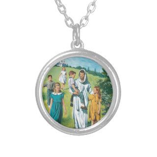 Jesus walking with children pendants