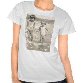 2 kids holding hands in water t shirt