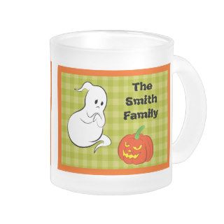 Ghost being frighten by a pumpkin coffee mugs