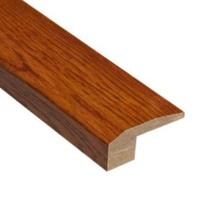 Home Legend High Gloss Oak Gunstock 3/8 in. Thick x 2 1/8 in. Wide x 78 in. Length Hardwood Carpet Reducer Molding HL110CRH