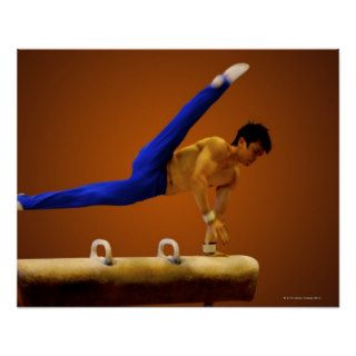 Young man practicing gymnastics on the pommel print