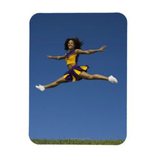 Female cheerleader doing jump splits in air rectangle magnets