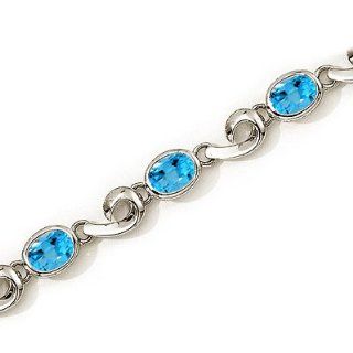 14K White Gold Oval Blue Topaz Bracelet by Jewelry Mountain Jewelry