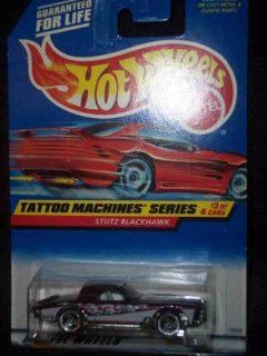 Tattoo Machines #3 Stutz Blackhawk #687 Purple Car on RED Card 164 Scale Toys & Games