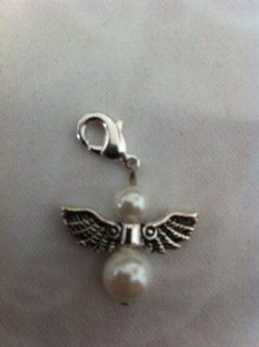 Divine Beads, forget me not faux pearl angel dangle clip on charm bead fits Thomas Sabo, mobile phones, handbags, purses etc. All orders from Divine Beads will receive a free gift Jewelry