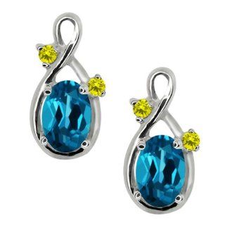 1.18 Ct Oval London Blue Topaz and Canary Diamond 18k White Gold Earrings Jewelry