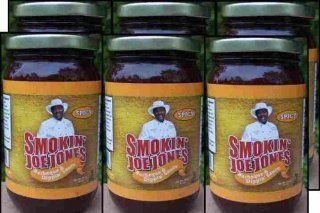 Spicy Barbecue Sauce by Smokin' Joe Jones Spicy Flavor 6 Pack of 18 oz. jars. Cayenne and black pepper added for a little heat, no habanero or jalapeno peppers used, so this won't burn your lips. Sweetened with wild honey. No brown sugar means this