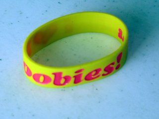 New Fashion Silicone Rubber Glow in the dark Bracelet "Heart Boobies " Yellow / Red