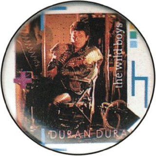 Duran Duran   The Wild Boys (Roger Taylor in Leather with "The Wild Boys" in White on Side and Logo Below in Pink)   1 1/4" Button / Pin Clothing