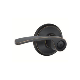 Schlage Bed and Bath Merano Aged Bronze Push Button Lock Residential Privacy Door Lever