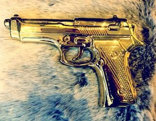 limited edition gold porcelain gun ornament by lime lace