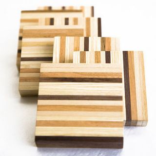 set of four striped solid wood coasters by sylph furniture