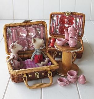 ceramic tea set in a wicker basket by posh totty designs interiors
