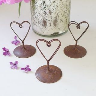 rust wire heart placecard holder by lilac coast weddings