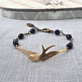 golden soaring bird bracelet by gama
