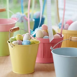 set of four pastel tin buckets by the contemporary home