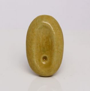 beige oval ceramic bantas knob by trinca ferro