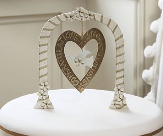 cream and gold arch wedding cake decoration by birchcraft
