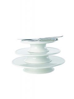 white cake stands by leaf