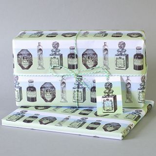 two sheets of parfum print wrapping paper by rosa & clara designs