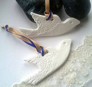 two white ceramic dove decorations by little brick house ceramics