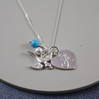 silver birthstone necklace with swallow by claudette worters