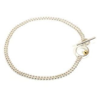gold ball double chain bracelet by machi de waard jewellery
