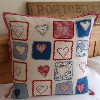 patchwork hearts cushion by two little birdies
