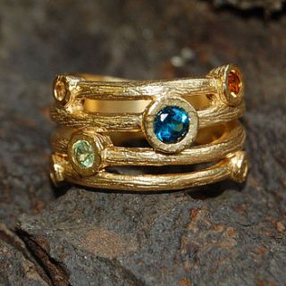 gold and blue topaz textured bands ring by embers semi precious and gemstone designs