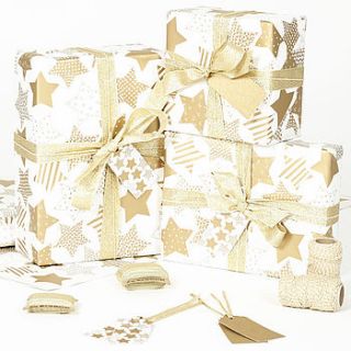 gold stars white wrapping paper by sophia victoria joy