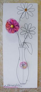 iron wire wall hanging with detachable brooch daisies by helaina sharpley