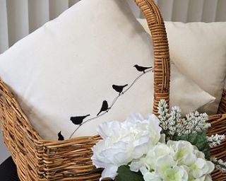 embroidered birds on a wire cushion by iredale towers