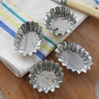 four decorative vintage baking moulds by magpie living