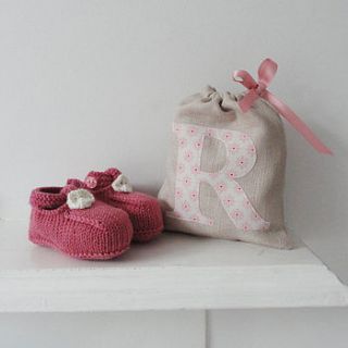 personalised baby booties in a bag by little foundry