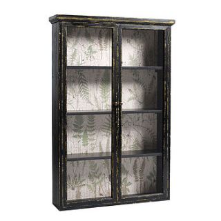 distressed upright cabinet by out there interiors