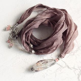 raw quartz crystal pendant on silk by artique boutique