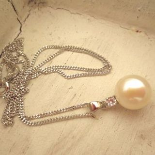 pearl and cubic zirconia pendant by tigerlily jewellery