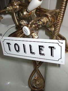 retro toilet hanging sign by the hiding place