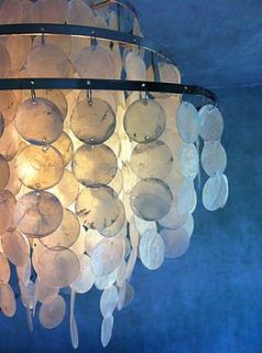 fabulous rustic luxe shell chandelier by the forest & co