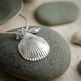 silver scallop sea shell necklace on leather cord by sally clay