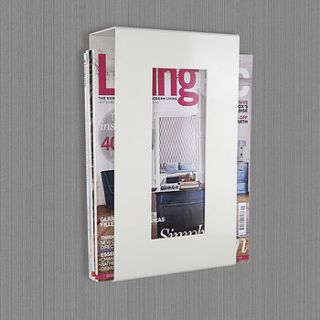 wall mounted magazine storage rack by the metal house