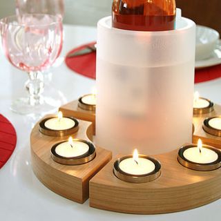 set of four curved tea lights by red lilly