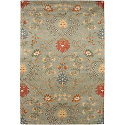 Hand tufted Ivory, Red And Green Wool Rug (36 X 56)