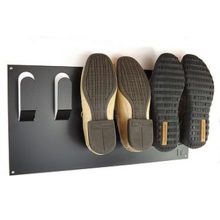 stylish wall mounted shoe rack by the metal house