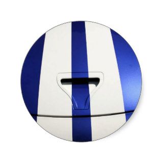 blue sports car hood with racing stripes sticker