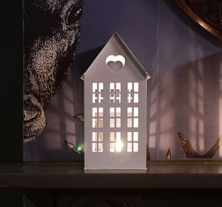 white metal candle house by the heart store