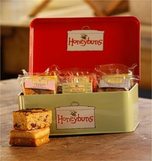 gift tin containing gluten free cakes by honeybuns