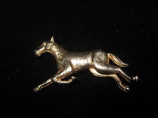 vintage galloping horse brooch by maison ami